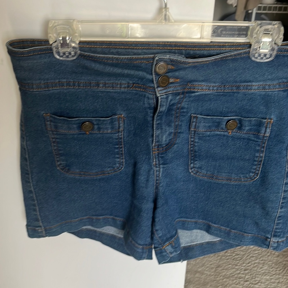 Blue jean shorts with cute pockets on the front